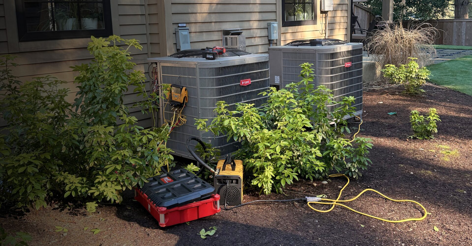 Heat pump replacement in Seattle, WA — Fuse Service technician installing outdoor unit