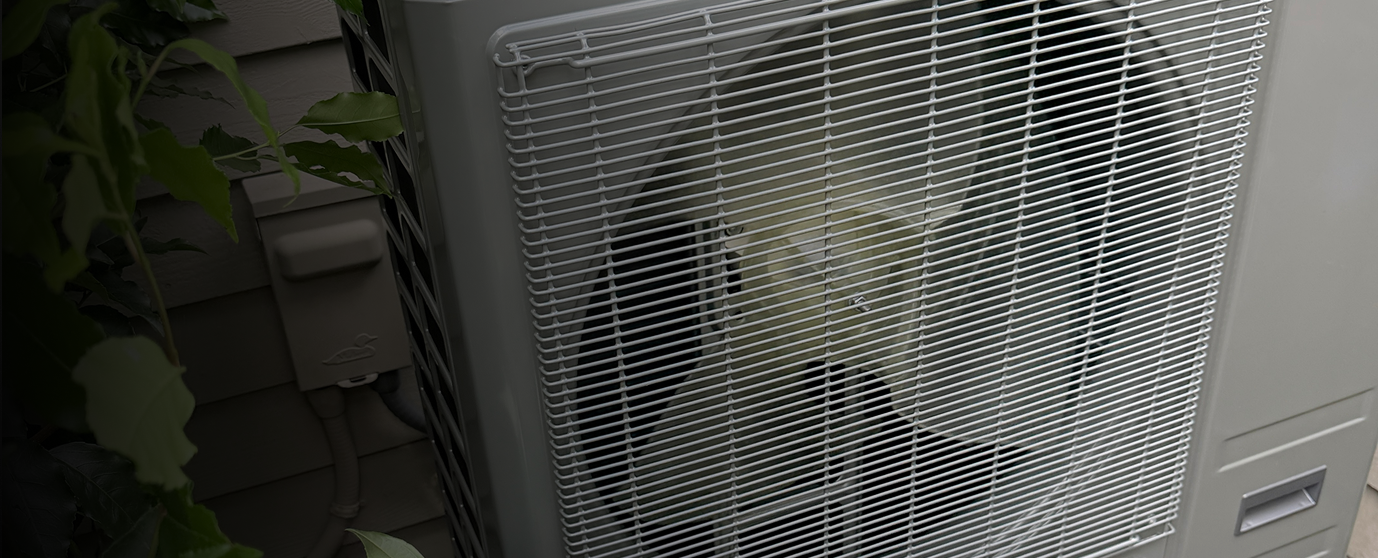 Heat pump fan grille close-up after installation